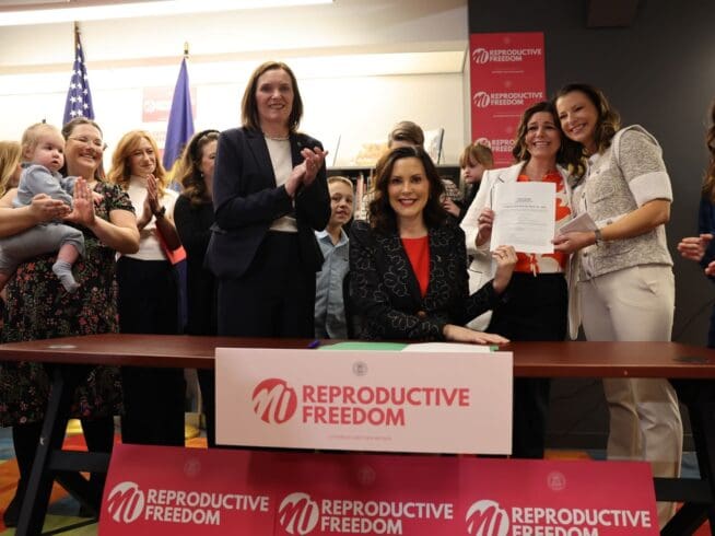 Governor Gretchen Whitmer signing the Michigan Family Protection Act on April 1, 2024. (Credit: Executive Office of the Governor)