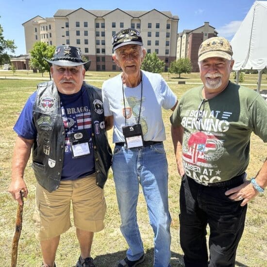 Vincent Ochoa, left, Patrick McGuire, center, and Mark Melancon, right, all veterans of the U.S. Army's 82nd Airborne Division, pose for a photograph following the All American Hall of Fame Induction Ceremony at the military base then called Fort Bragg, on Wednesday, May 24, 2023, in Fort Liberty, N.C. (AP Photo/Michelle R. Smith)