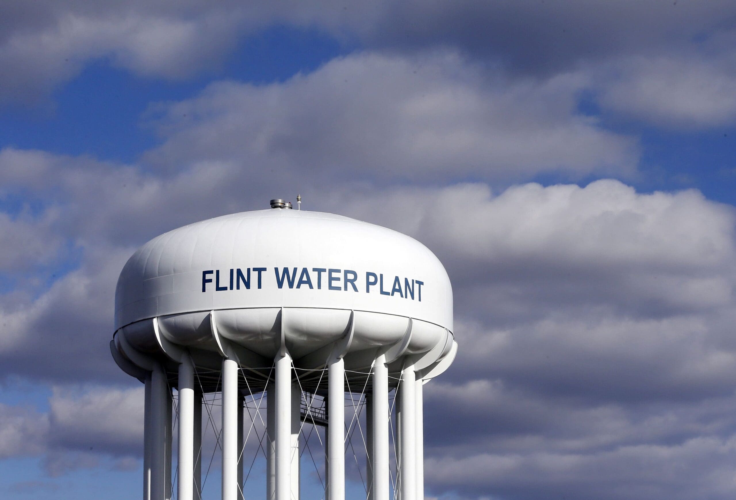 In this March 21, 2016, file photo, the Flint Water Plant water tower is seen in Flint, Mich.